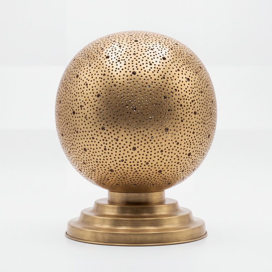Pierced brass sphere table lamp